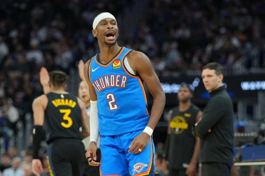 Oklahoma City Thunder guard Shai Gilgeous-Alexander (2) reacts after making a three point basket against the Golden State Warriors during the third quarter at Chase Center.