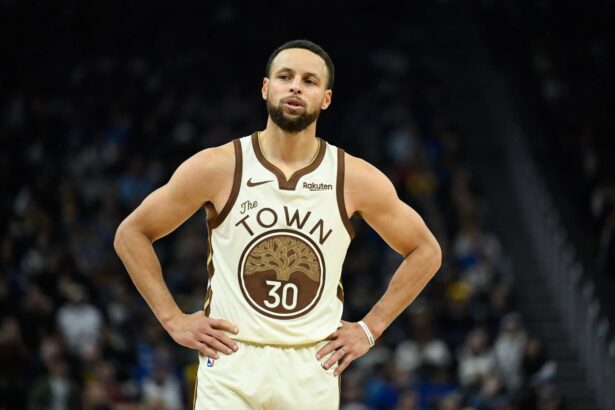 Golden State Warriors guard Stephen Curry (30) looks on against the Orlando Magic in the second quarter at Chase Center.