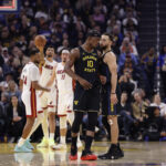 Jan 19, 2026; San Francisco, California, USA; Golden State Warriors forward Jimmy Butler III (10) and guard Stephen Curry (30) react after Butler misses a shot at the buzzer during the first quarter against the Miami Heat at Chase Center. Mandatory Credit: Kelley L Cox-Imagn Images