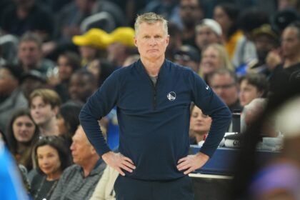 Golden State Warriors head coach Steve Kerr stands on the sideline during the first quarter against the Oklahoma City Thunder at Chase Center.