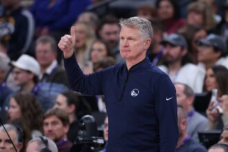 Jan 28, 2026; Salt Lake City, Utah, USA; Golden State Warriors head coach Steve Kerr reacts after a play against the Utah Jazz during the second half at Delta Center. Mandatory Credit: Rob Gray-Imagn Images
