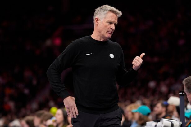 Dec 31, 2025; Charlotte, North Carolina, USA; Golden State Warriors head coach Steve Kerr reacts to a call during the second quarter against the Charlotte Hornets at Spectrum Center. Mandatory Credit: Jim Dedmon-Imagn Images