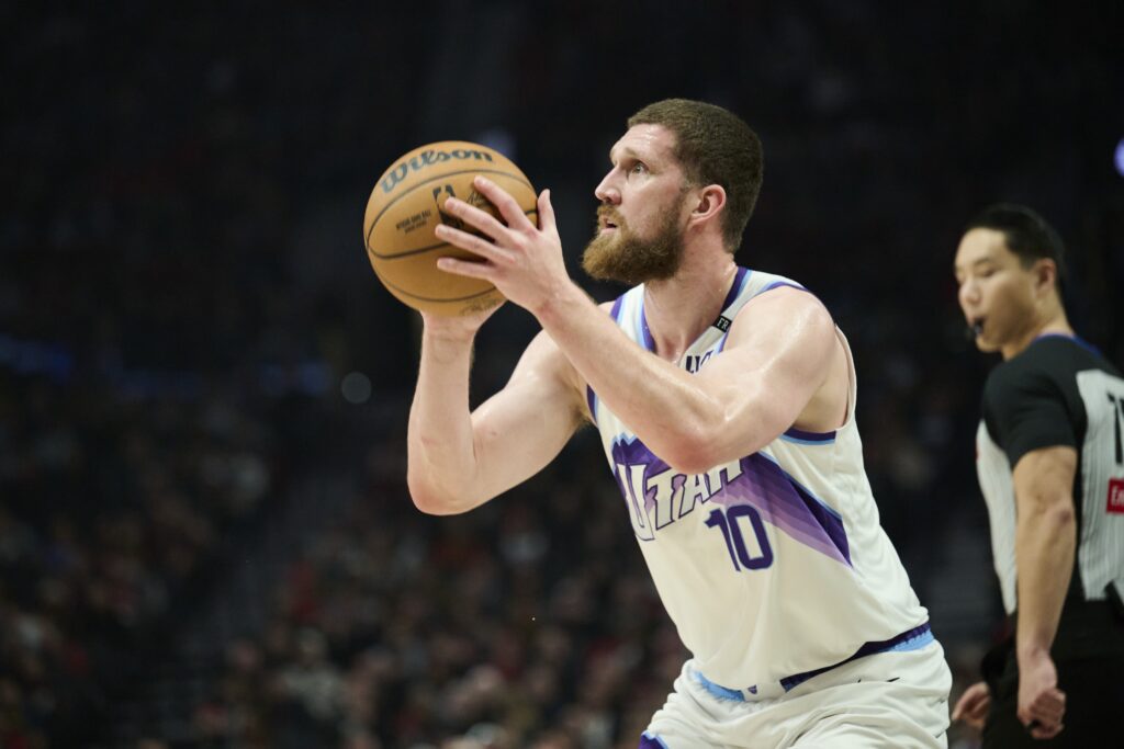Jan 5, 2026; Portland, Oregon, USA; Utah Jazz guard Svi Mykhailiuk (10) shoots a basket during the first half against the Portland Trail Blazers at Moda Center. Mandatory Credit: Troy Wayrynen-Imagn Images