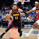 Feb 8, 2025; Washington, District of Columbia, USA; Atlanta Hawks guard Trae Young (11) drives past Washington Wizards guard Bilal Coulibaly (0) during the first half at Capital One Arena. Mandatory Credit: Daniel Kucin Jr.-Imagn Images