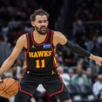 Dec 26, 2025; Atlanta, Georgia, USA; Atlanta Hawks guard Trae Young (11) points to teammates during the game against the Miami Heat during the third quarter at State Farm Arena. Mandatory Credit: Jordan Godfree-Imagn Images