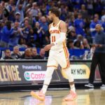 Apr 15, 2025; Orlando, Florida, USA; Atlanta Hawks guard Trae Young (11) reacts after given a technical foul against the Orlando Magic in the fourth quarter at Kia Center. Mandatory Credit: Nathan Ray Seebeck-Imagn Images