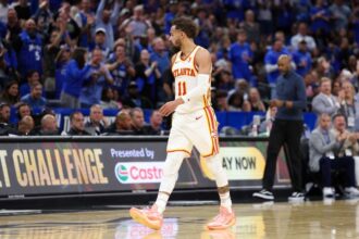 Apr 15, 2025; Orlando, Florida, USA; Atlanta Hawks guard Trae Young (11) reacts after given a technical foul against the Orlando Magic in the fourth quarter at Kia Center. Mandatory Credit: Nathan Ray Seebeck-Imagn Images