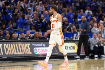 Apr 15, 2025; Orlando, Florida, USA; Atlanta Hawks guard Trae Young (11) reacts after given a technical foul against the Orlando Magic in the fourth quarter at Kia Center. Mandatory Credit: Nathan Ray Seebeck-Imagn Images