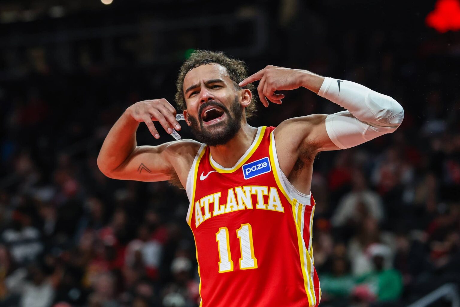 Dec 23, 2025; Atlanta, Georgia, USA; Atlanta Hawks guard Trae Young (11) yells at the referee during the game against the Chicago Bulls during the third quarter at State Farm Arena. Mandatory Credit: Jordan Godfree-Imagn Images