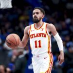 Apr 2, 2025; Dallas, Texas, USA; Atlanta Hawks guard Trae Young (11) dribbles against the Dallas Mavericks during the second half at American Airlines Center. Mandatory Credit: Kevin Jairaj-Imagn Images
