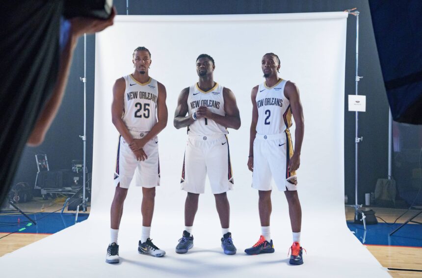 New Orleans Pelicans guard Trey Murphy III (25), forward Zion Williamson (1), and forward Herbert Jones (2) take part in media day at Ochsner Sports Performance Center.