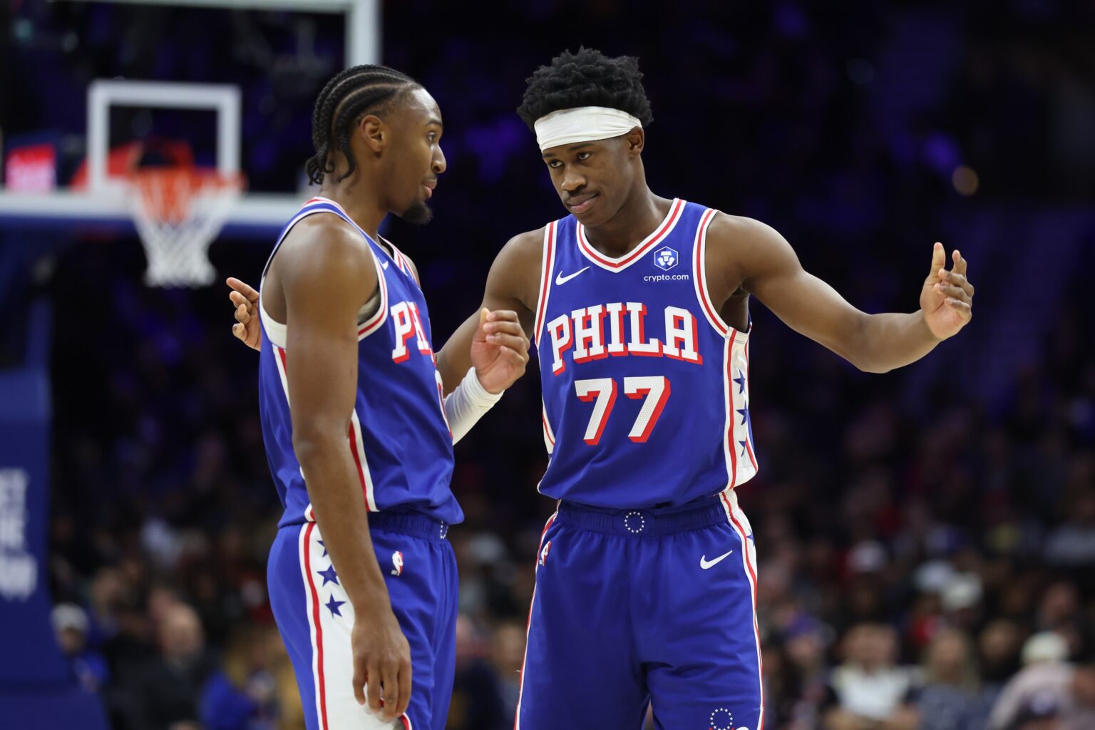 Jan 5, 2026; Philadelphia, Pennsylvania, USA; Philadelphia 76ers guard Vj Edgecombe (77) reacts with guard Tyrese Maxey (0) during the fourth quarter against the Denver Nuggets at Xfinity Mobile Arena. Mandatory Credit: Bill Streicher-Imagn Images