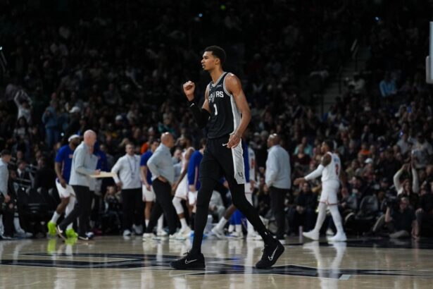 Dec 31, 2025; San Antonio, Texas, USA; San Antonio Spurs forward Victor Wembanyama (1) celebrates in the second half against the New York Knicks at Frost Bank Center. Mandatory Credit: Daniel Dunn-Imagn Images