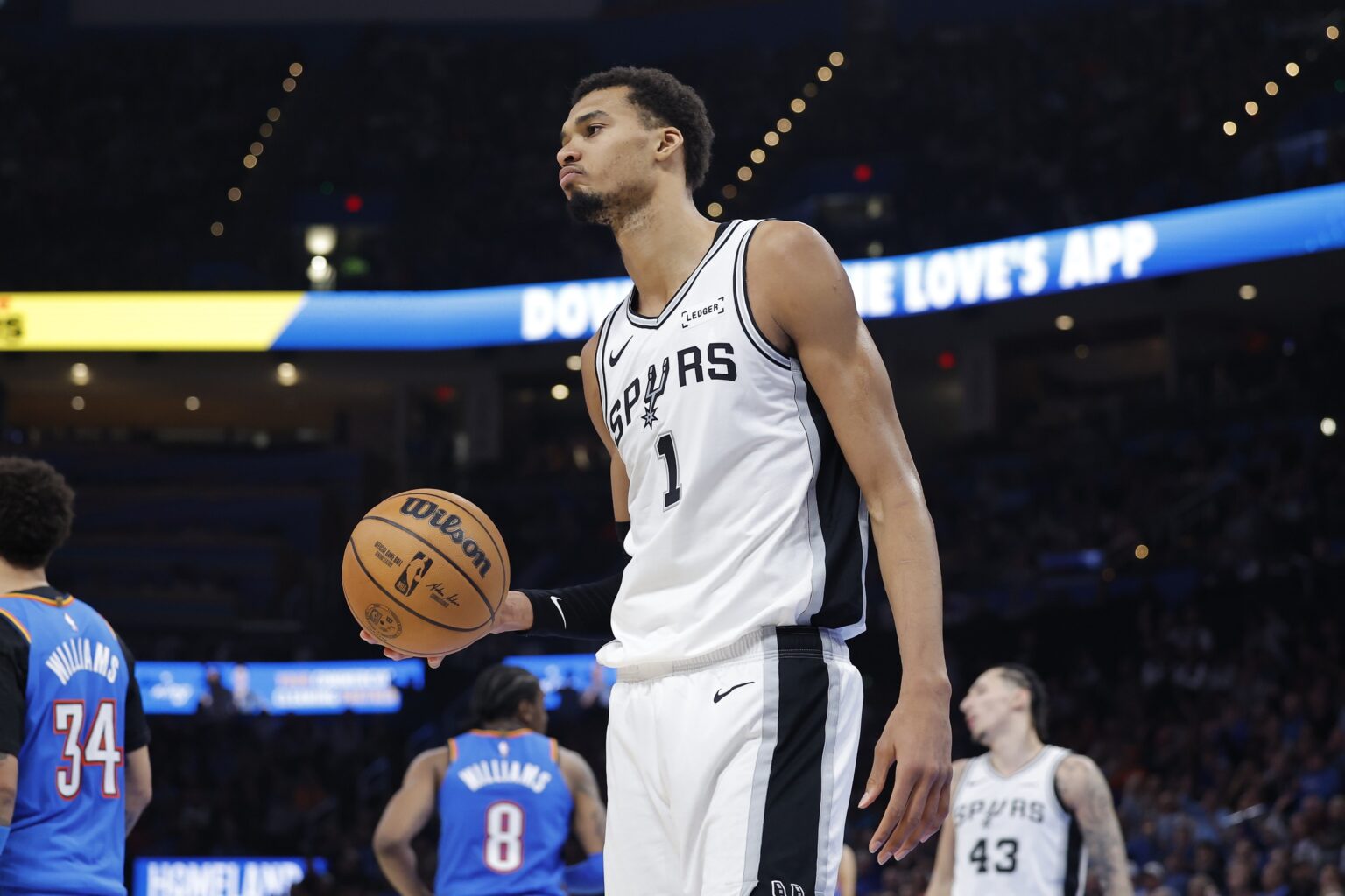 Jan 13, 2026; Oklahoma City, Oklahoma, USA; San Antonio Spurs forward/center Victor Wembanyama (1) walks off the court during a time out against the Oklahoma City Thunder during the second half at Paycom Center. Mandatory Credit: Alonzo Adams-Imagn Images