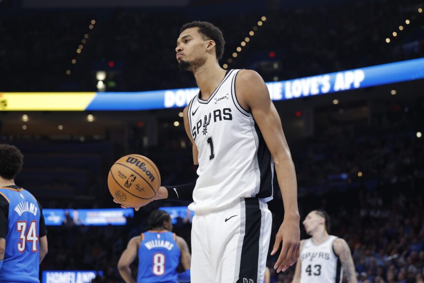 Jan 13, 2026; Oklahoma City, Oklahoma, USA; San Antonio Spurs forward/center Victor Wembanyama (1) walks off the court during a time out against the Oklahoma City Thunder during the second half at Paycom Center. Mandatory Credit: Alonzo Adams-Imagn Images