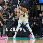 Jan 15, 2026; San Antonio, Texas, USA; Milwaukee Bucks forward Giannis Antetokounmpo (34) backs up against San Antonio Spurs forward/center Victor Wembanyama (1) in the first half at Frost Bank Center. Mandatory Credit: Daniel Dunn-Imagn Images