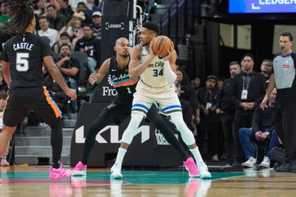 Jan 15, 2026; San Antonio, Texas, USA; Milwaukee Bucks forward Giannis Antetokounmpo (34) backs up against San Antonio Spurs forward/center Victor Wembanyama (1) in the first half at Frost Bank Center. Mandatory Credit: Daniel Dunn-Imagn Images