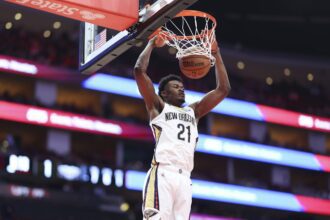 Mar 8, 2025; Houston, Texas, USA; New Orleans Pelicans center Yves Missi (21) dunks the ball during the first quarter against the Houston Rockets at Toyota Center. Mandatory Credit: Troy Taormina-Imagn Images