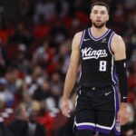 Sacramento Kings guard Zach LaVine (8) walks on the court during the first half at United Center.