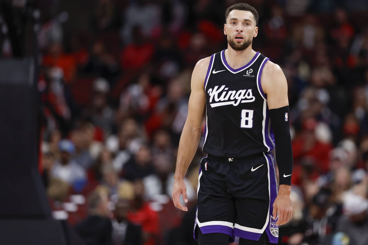 Sacramento Kings guard Zach LaVine (8) walks on the court during the first half at United Center.