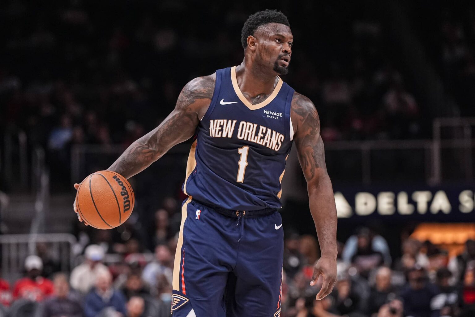 New Orleans Pelicans forward Zion Williamson (1) controls the ball against the Atlanta Hawks during the first half at State Farm Arena.