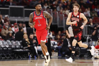 Dec 14, 2025; Chicago, Illinois, USA; New Orleans Pelicans forward Zion Williamson (1) reacts after scoring against the Chicago Bulls during the first half at United Center. Mandatory Credit: Kamil Krzaczynski-Imagn Images