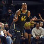 Memphis, Tennessee, USA; Golden State Warriors guard-forward Andre Iguodala (9) reacts as Memphis Grizzlies fans boo after a three point basket during the first half against the Memphis Grizzlies at FedExForum. Mandatory Credit: Petre Thomas-Imagn Images