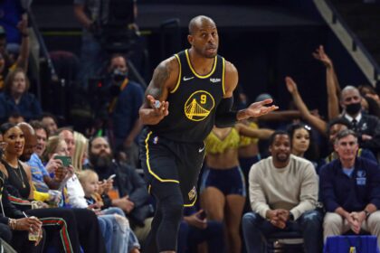 Memphis, Tennessee, USA; Golden State Warriors guard-forward Andre Iguodala (9) reacts as Memphis Grizzlies fans boo after a three point basket during the first half against the Memphis Grizzlies at FedExForum. Mandatory Credit: Petre Thomas-Imagn Images