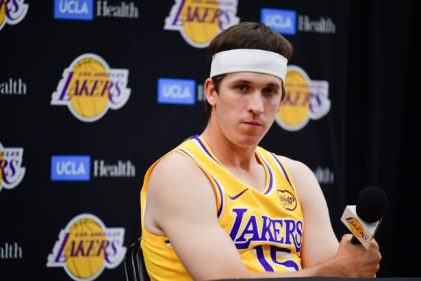 Los Angeles, CA, USA; Los Angeles Lakers guard Austin Reaves (15) during media day at UCLA Health Training Center. Mandatory Credit: Gary A. Vasquez-Imagn Images