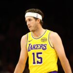 Phoenix, Arizona, USA; Los Angeles Lakers guard Austin Reaves (15) against the Phoenix Suns during an NBA preseason game at Mortgage Matchup Center. Mandatory Credit: Mark J. Rebilas-Imagn Images