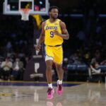 Los Angeles, California, USA; Los Angeles Lakers guard Bronny James (9) against the Charlotte Hornets in the second half at Crypto.com Arena. Mandatory Credit: Kirby Lee-Imagn Images