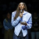 Chicago, Illinois, USA; Chicago Sky franchise legend and WNBA Champion Candace Parker speaks during her jersey retainment ceremony during a WNBA game between the Chicago Sky and Las Vegas Aces at Wintrust Arena. Mandatory Credit: Kamil Krzaczynski-Imagn Images