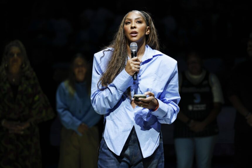 Chicago, Illinois, USA; Chicago Sky franchise legend and WNBA Champion Candace Parker speaks during her jersey retainment ceremony during a WNBA game between the Chicago Sky and Las Vegas Aces at Wintrust Arena. Mandatory Credit: Kamil Krzaczynski-Imagn Images