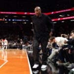 Phoenix, Arizona, USA; Phoenix Suns former player Charles Barkley walks off the court in the fourth quarter against the Minnesota Timberwolves during an NBA Cup game at Mortgage Matchup Center. Mandatory Credit: Mark J. Rebilas-Imagn Images