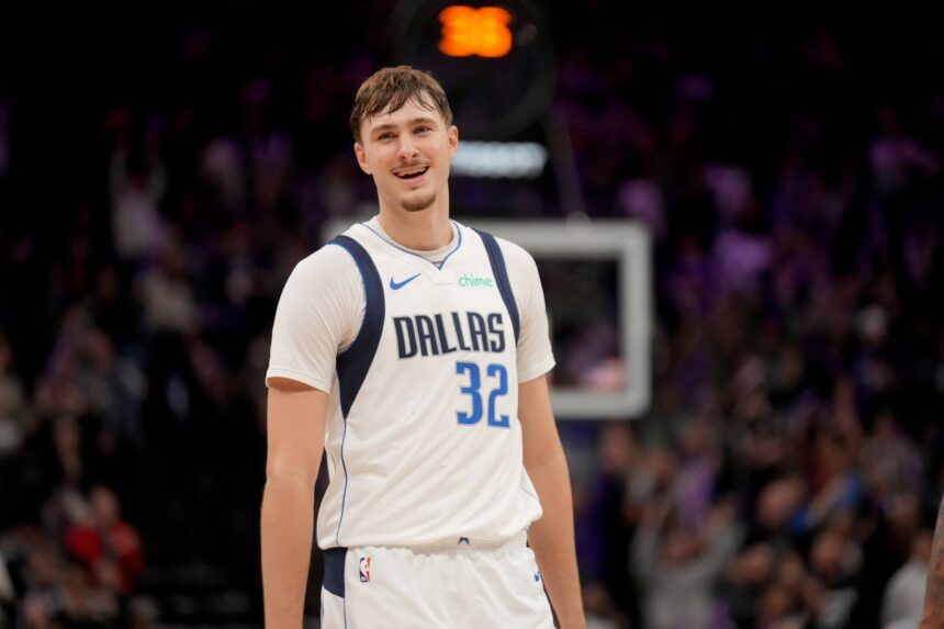 Sacramento, California, USA; Dallas Mavericks forward Cooper Flagg (32) reacts after a foul was called during action against the Sacramento Kings in the fourth quarter at the Golden 1 Center. Mandatory Credit: Cary Edmondson-Imagn Images