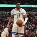 Chicago, Illinois, USA; Milwaukee Bucks forward Giannis Antetokounmpo (34) reacts after scoring against the Chicago Bulls during the second half at United Center. Mandatory Credit: David Banks-Imagn Images