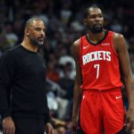 Denver, Colorado, USA; Houston Rockets forward Kevin Durant (7) talks with head coach Ime Udoka during the second half against the Denver Nuggets at Ball Arena. Mandatory Credit: Christopher Hanewinckel-Imagn Images