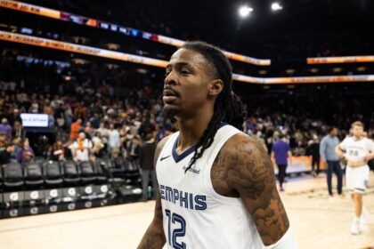 Phoenix, Arizona, USA; Memphis Grizzlies guard Ja Morant (12) against the Phoenix Suns at the Mortgage Matchup Center. Mandatory Credit: Mark J. Rebilas-Imagn Images