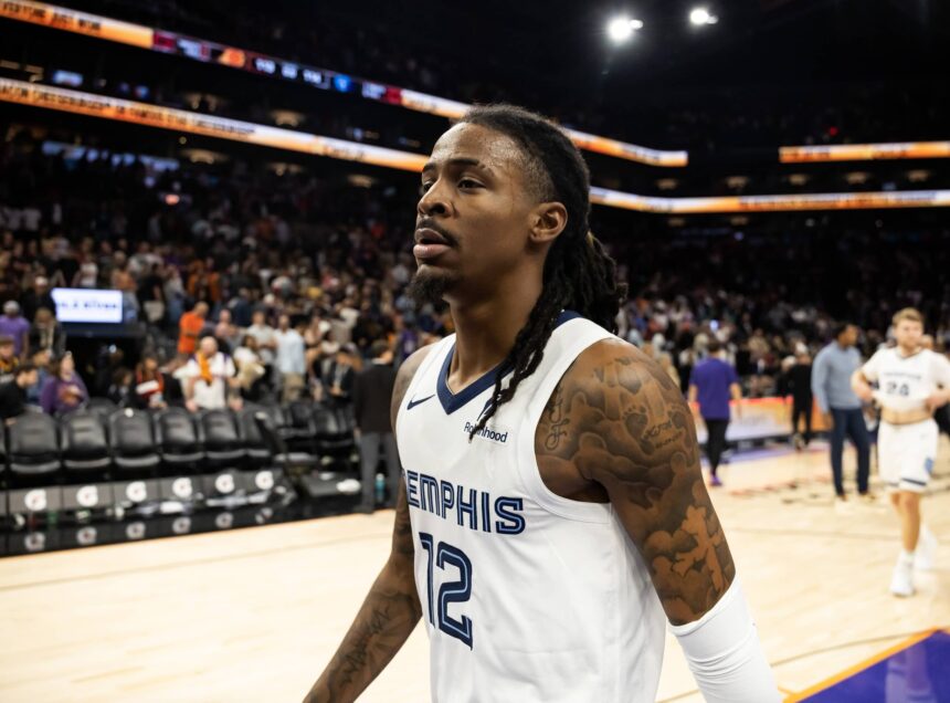 Phoenix, Arizona, USA; Memphis Grizzlies guard Ja Morant (12) against the Phoenix Suns at the Mortgage Matchup Center. Mandatory Credit: Mark J. Rebilas-Imagn Images