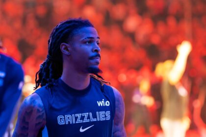 Phoenix, Arizona, USA; Memphis Grizzlies guard Ja Morant (12) against the Phoenix Suns at the Mortgage Matchup Center. Mandatory Credit: Mark J. Rebilas-Imagn Images