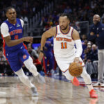 Jan 5, 2026; Detroit, Michigan, USA; New York Knicks guard Jalen Brunson (11) dribbles on Detroit Pistons guard Ausar Thompson (9) in the first half at Little Caesars Arena. Mandatory Credit: Rick Osentoski-Imagn Images