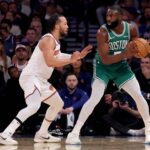 New York, New York, USA; Boston Celtics guard Jaylen Brown (7) controls the ball against New York Knicks guard Jalen Brunson (11) during the first quarter of game six in the second round of the 2025 NBA Playoffs at Madison Square Garden. Mandatory Credit: Brad Penner-Imagn Images