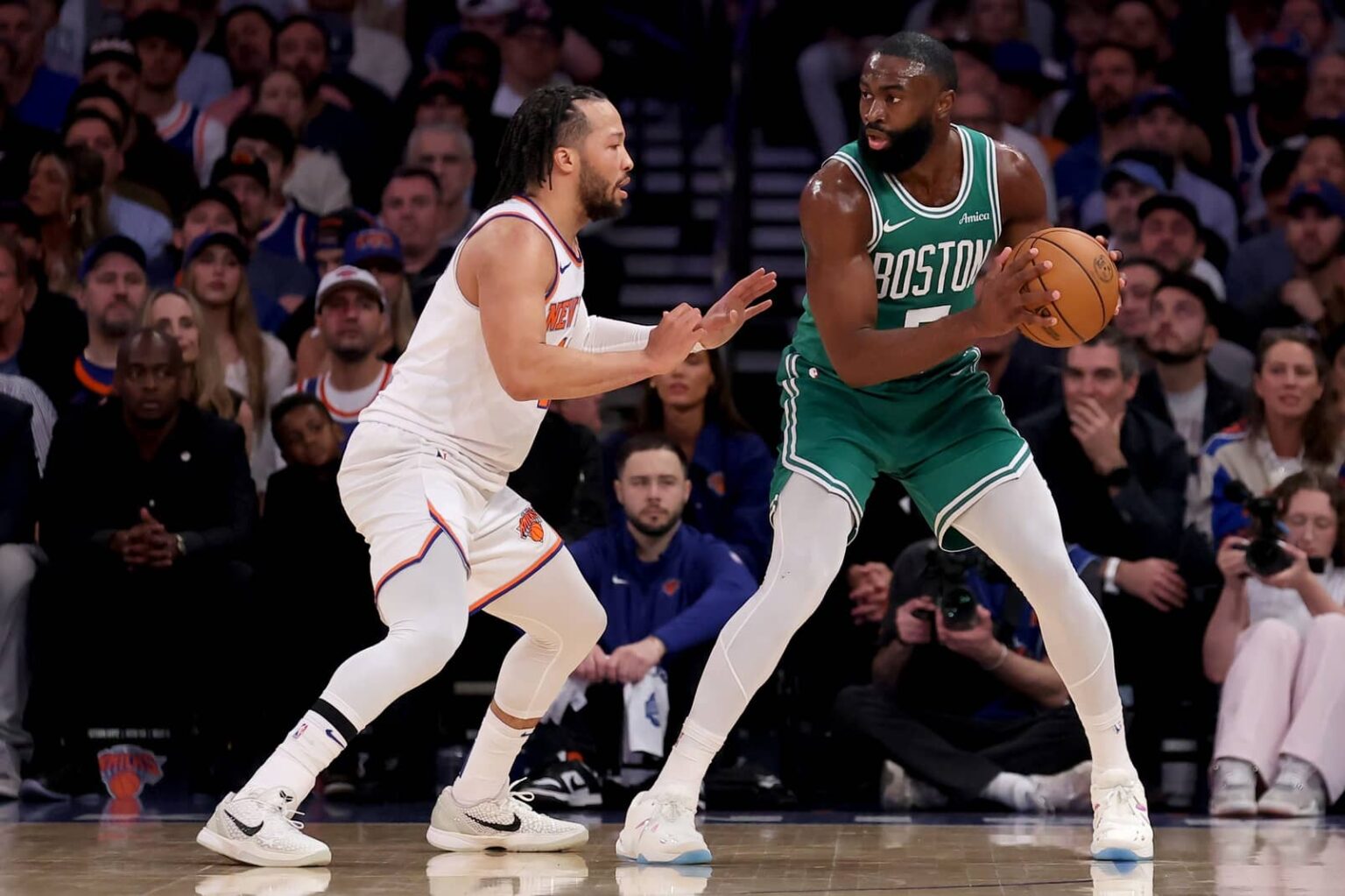New York, New York, USA; Boston Celtics guard Jaylen Brown (7) controls the ball against New York Knicks guard Jalen Brunson (11) during the first quarter of game six in the second round of the 2025 NBA Playoffs at Madison Square Garden. Mandatory Credit: Brad Penner-Imagn Images