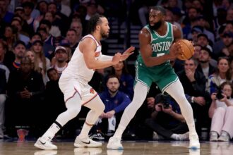 New York, New York, USA; Boston Celtics guard Jaylen Brown (7) controls the ball against New York Knicks guard Jalen Brunson (11) during the first quarter of game six in the second round of the 2025 NBA Playoffs at Madison Square Garden. Mandatory Credit: Brad Penner-Imagn Images