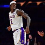 Los Angeles, California, USA; Los Angeles Lakers forward Jarred Vanderbilt (2) reacts after scoring a three point basket against the Houston Rockets during the first half at Crypto.com Arena. Mandatory Credit: Gary A. Vasquez-Imagn Images
