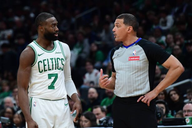 Boston, Massachusetts, USA; Boston Celtics guard Jaylen Brown (7) talks to the official during the second half against the Indiana Pacers at TD Garden. Mandatory Credit: Bob DeChiara-Imagn Images