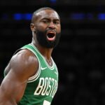 Boston, Massachusetts, USA; Boston Celtics guard Jaylen Brown (7) reacts after scoring against the New York Knicks during the second half at the TD Garden. Mandatory Credit: Brian Fluharty-Imagn Images