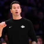 Los Angeles, California, USA; Los Angeles Lakers Head Coach JJ Redick reacts to a play during the fourth quarter against the Memphis Grizzlies at Crypto.com Arena. Mandatory Credit: Kiyoshi Mio-Imagn Images