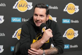 Los Angeles, California, USA; Los Angeles Lakers head coach JJ Redick at press conference at the Crypto.com Arena. Mandatory Credit: Kirby Lee-Imagn Images