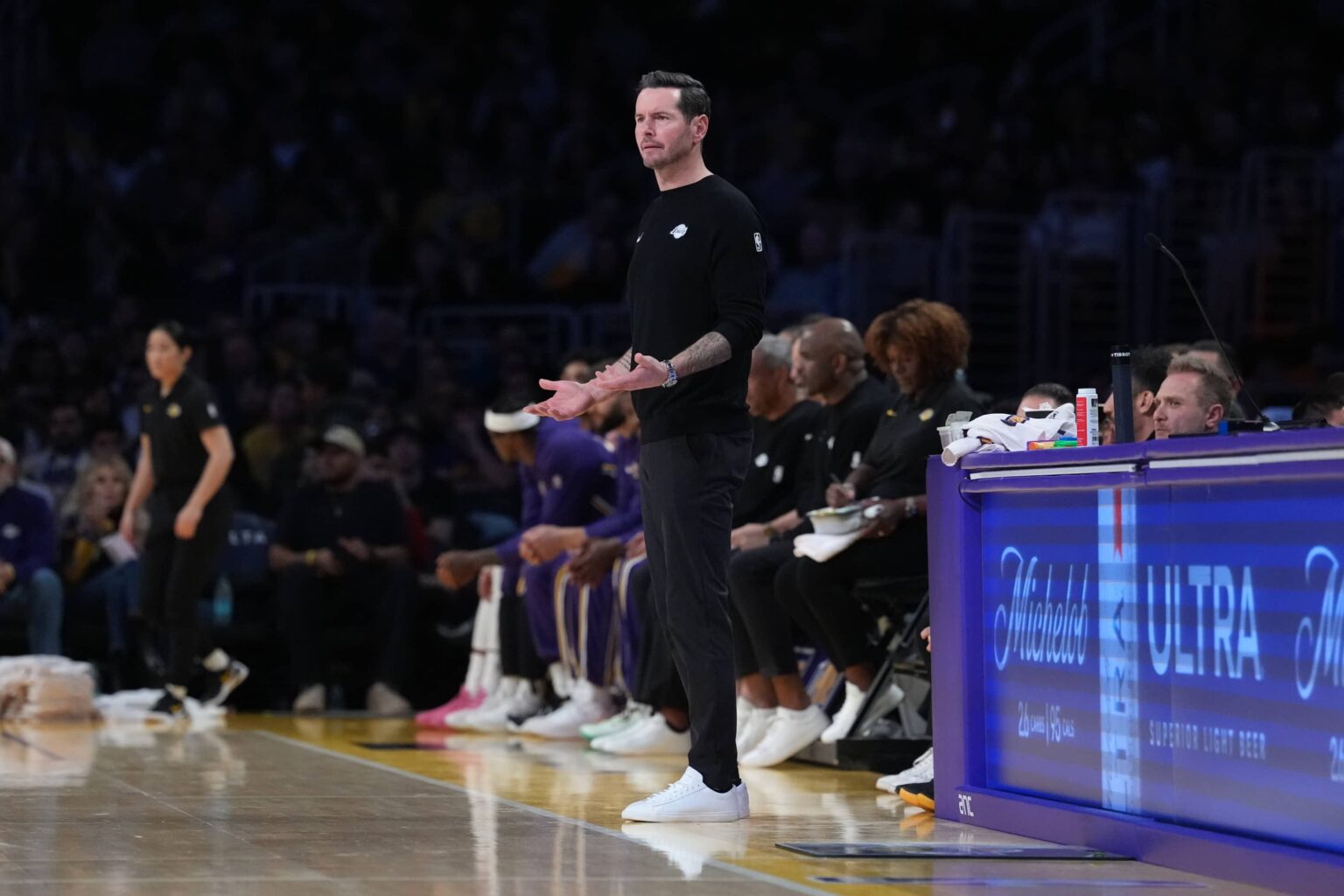 Los Angeles, California, USA; Los Angeles Lakers head coach JJ Redick reacts against the Charlotte Hornets in the second half at Crypto.com Arena. Mandatory Credit: Kirby Lee-Imagn Images
